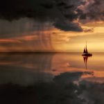 Sailing Storm - Silhouette Photography Of Boat On Water during Sunset
