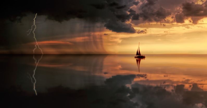 Sailing Storm - Silhouette Photography Of Boat On Water during Sunset