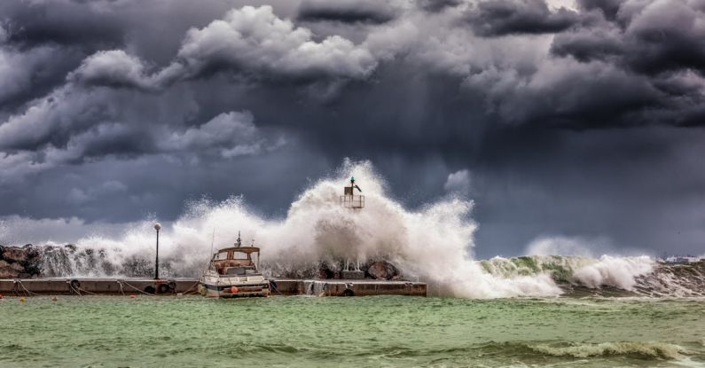 Boat Storm - Big Waves Under Cloudy Sky