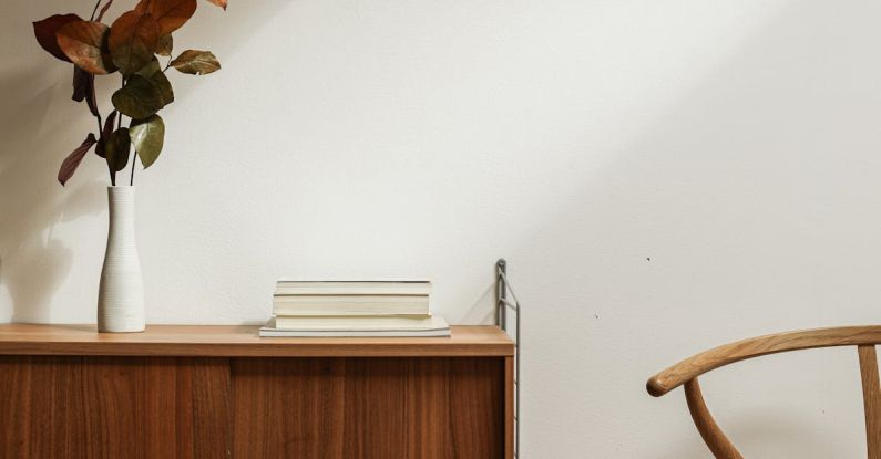 Minimalist Desk - Brown Wooden Chair Beside Brown Wooden Cabinet