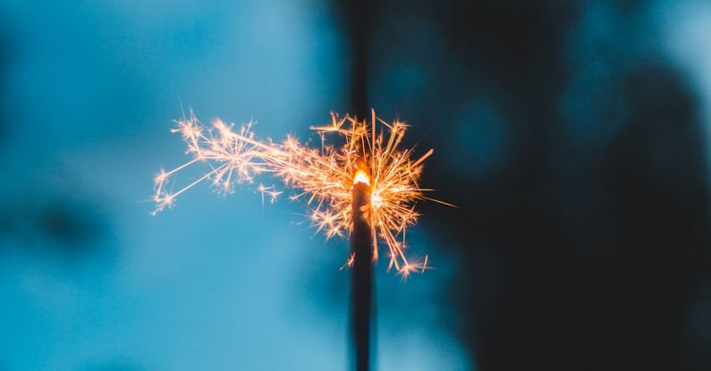 Firework Inspiration - Sparkling Bengal light in park at night
