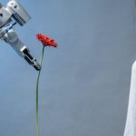 Robot Human - A Robot Giving a Woman a Flower
