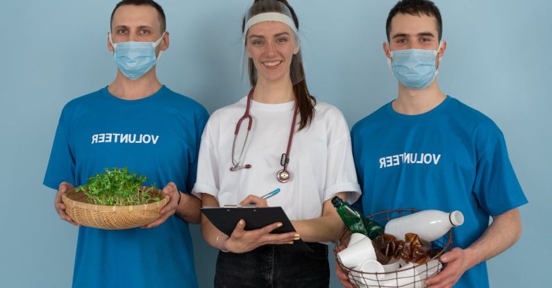 Hospital Future - Woman in White Crew Neck T-shirt Holding Black Tablet Computer Beside Man in Blue Crew
