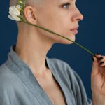 Brain Flowers - Woman with blooming flower on blue background