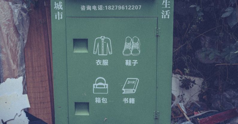 Clothes Recycle - Photo of Shoes Near a Green Container