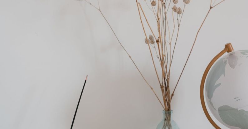 Minimalist Earth - Dry Flowers in a Clear Bottle