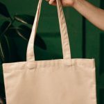 Shopping Bag Planet - Person Holding White Tote Bag