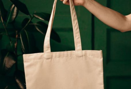 Shopping Bag Planet - Person Holding White Tote Bag