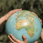 Hands Earth - People Holding a Globe