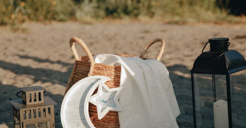 Moon Pillow - Woven Basket, Lanterns and Pillow on the Sand