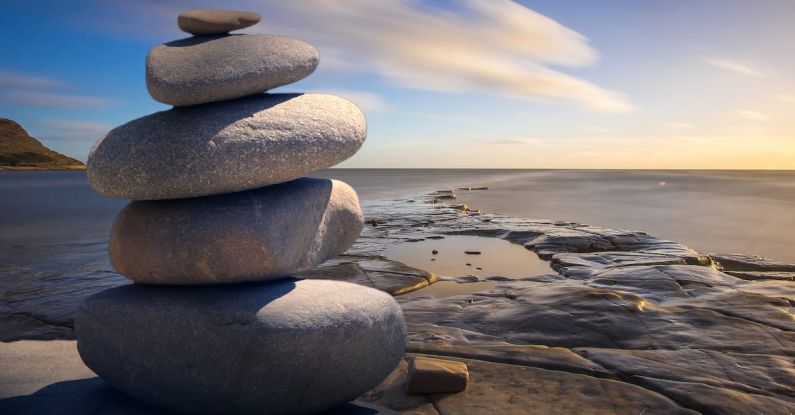 Meditation Sunset - Stacked of Stones Outdoors