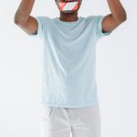 Tape Mouth - Man with Mouth Tape Holding a Stop Signage