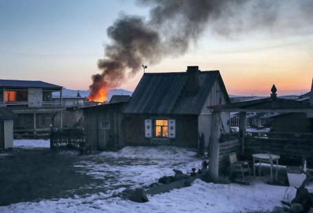 Ice Fire - Gray Wooden House Burning