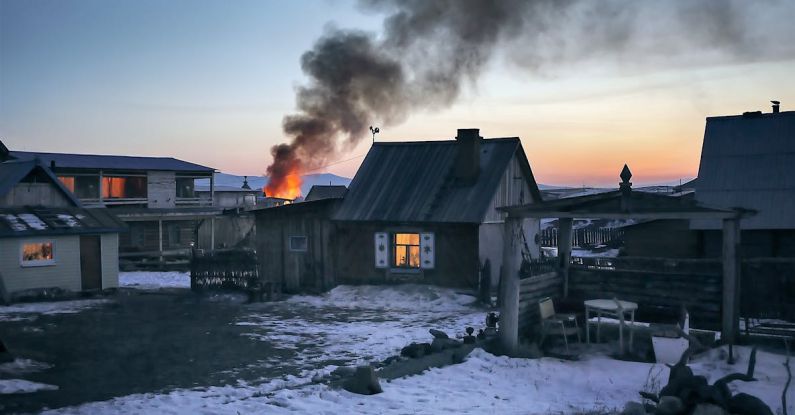 Ice Fire - Gray Wooden House Burning